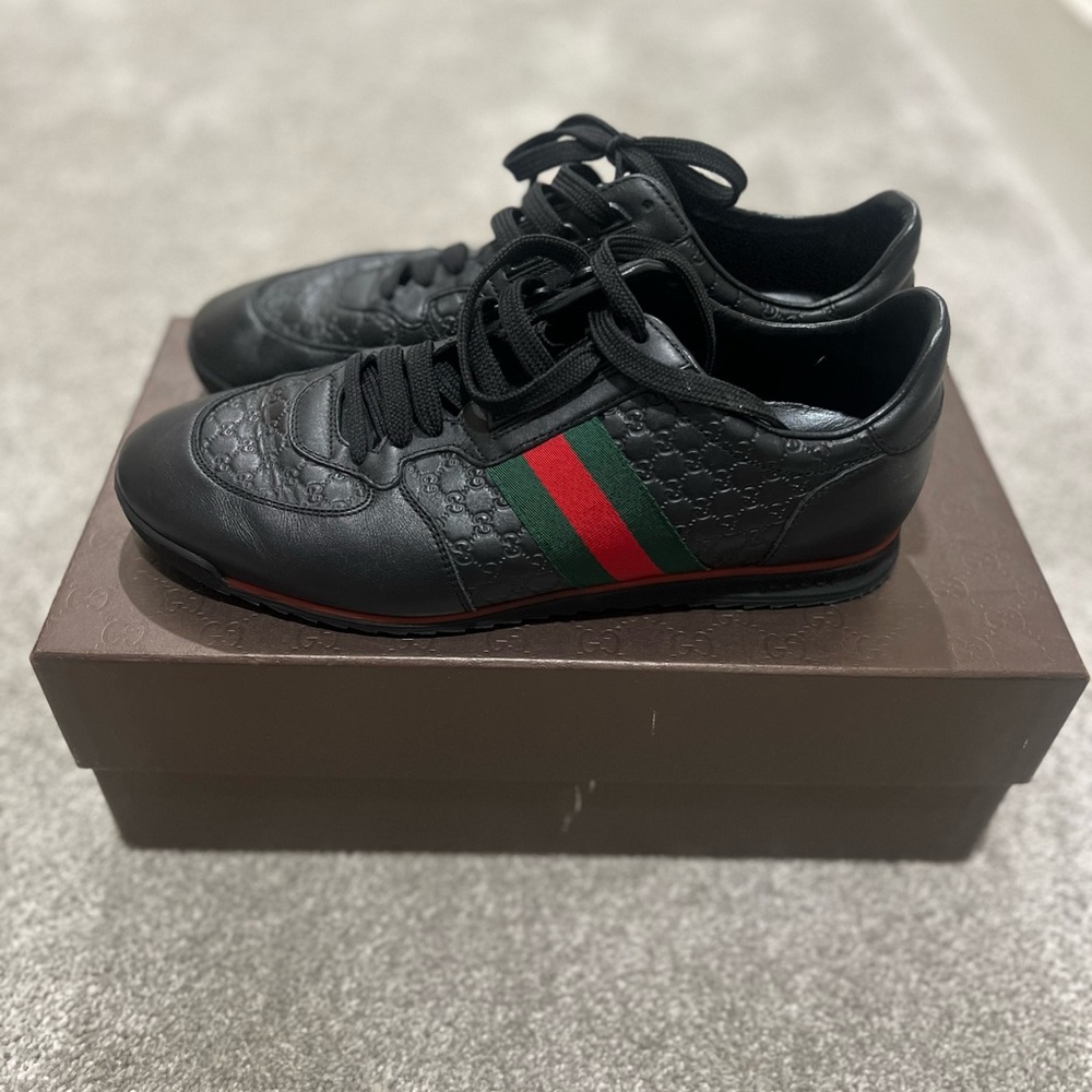 Black Gucci tennis shoes